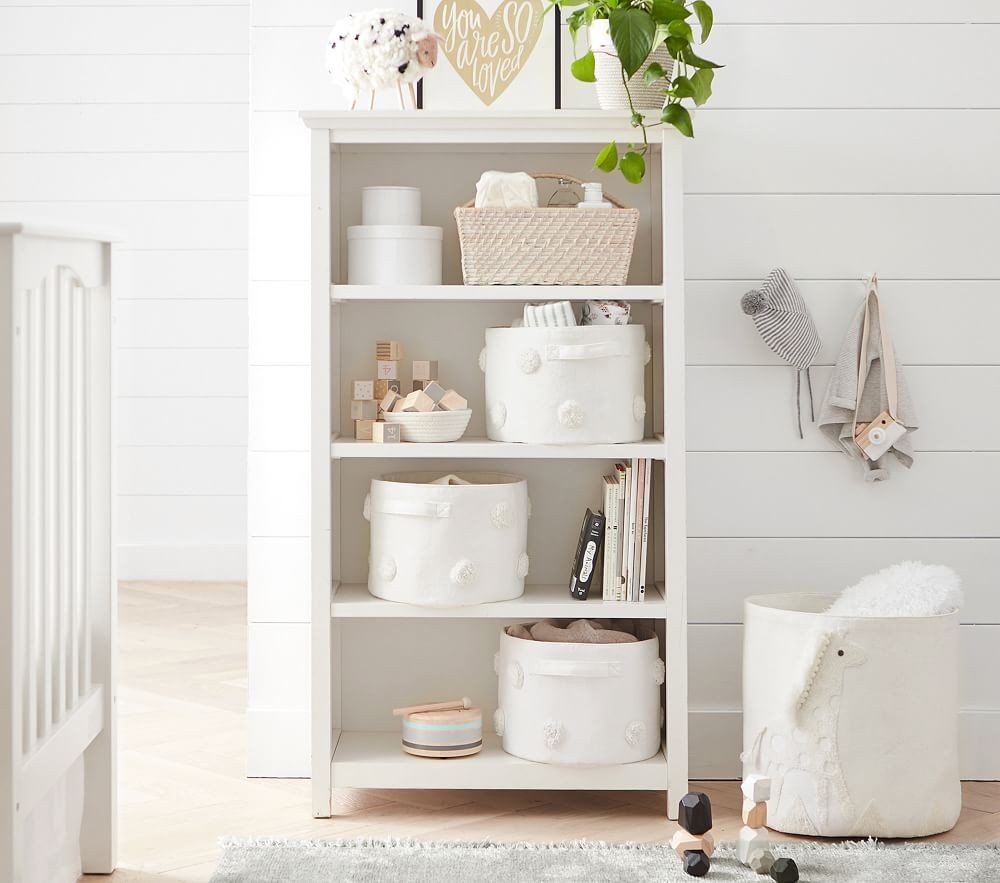 Pottery barn store bookcase with doors