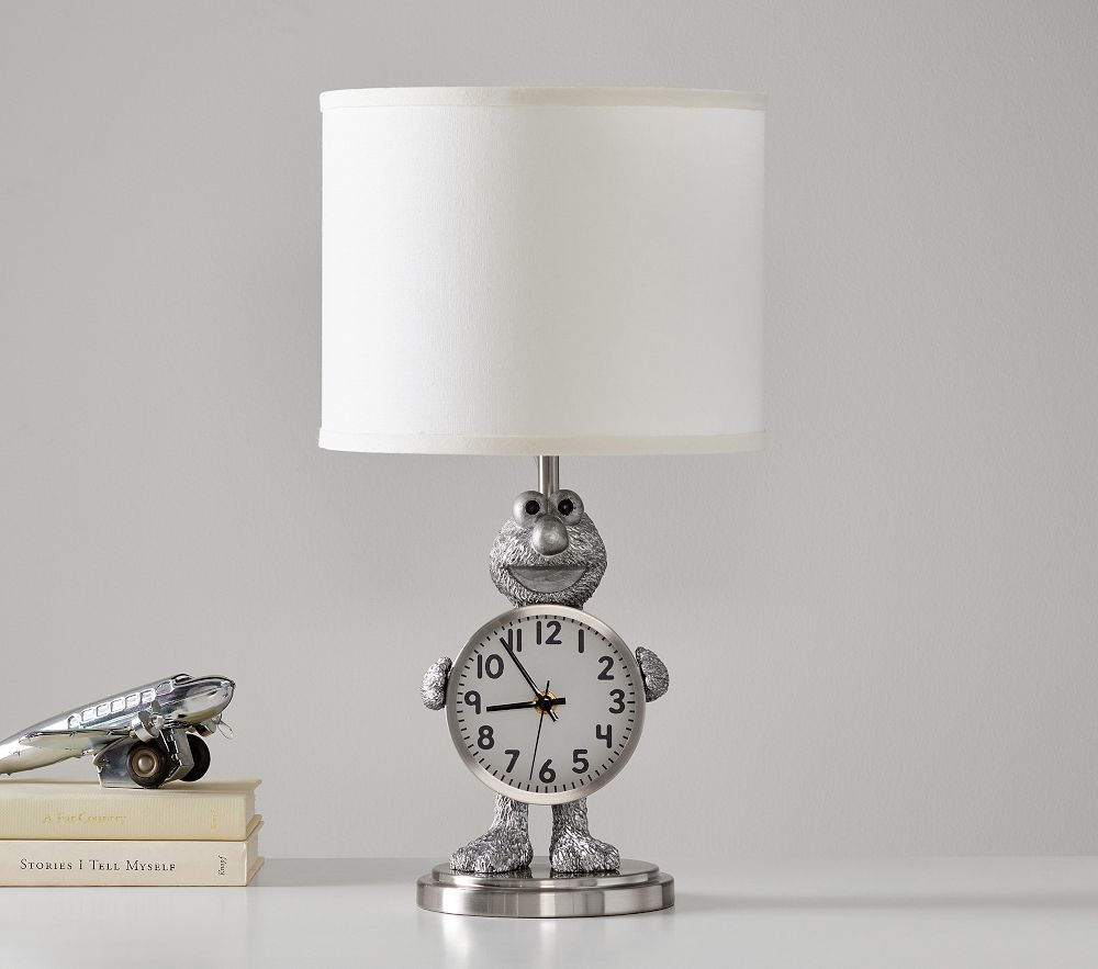 Table lamp with clearance clock